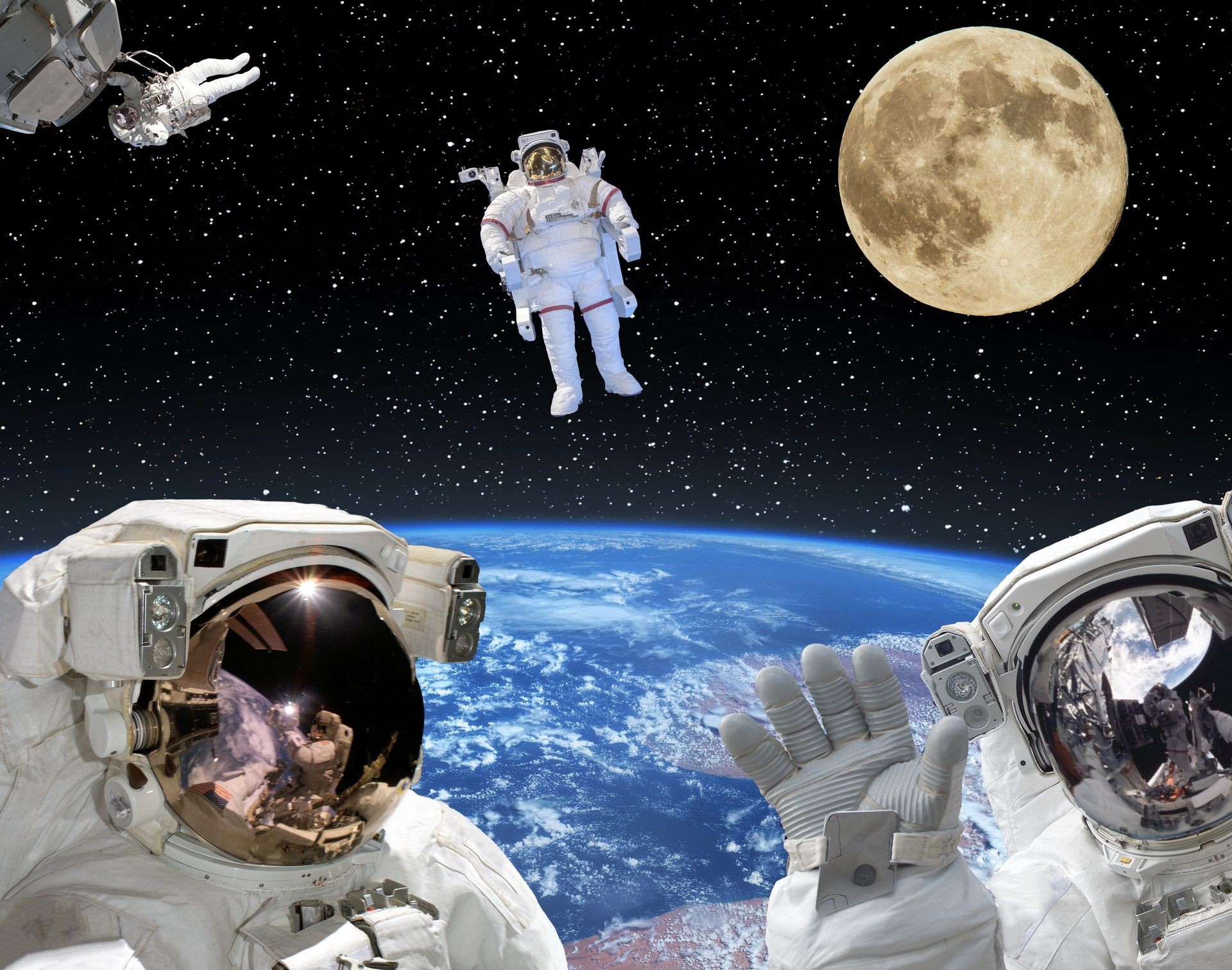 Astronauts flying in space. Moon and earth in free space. The elements of this image furnished by NASA.
